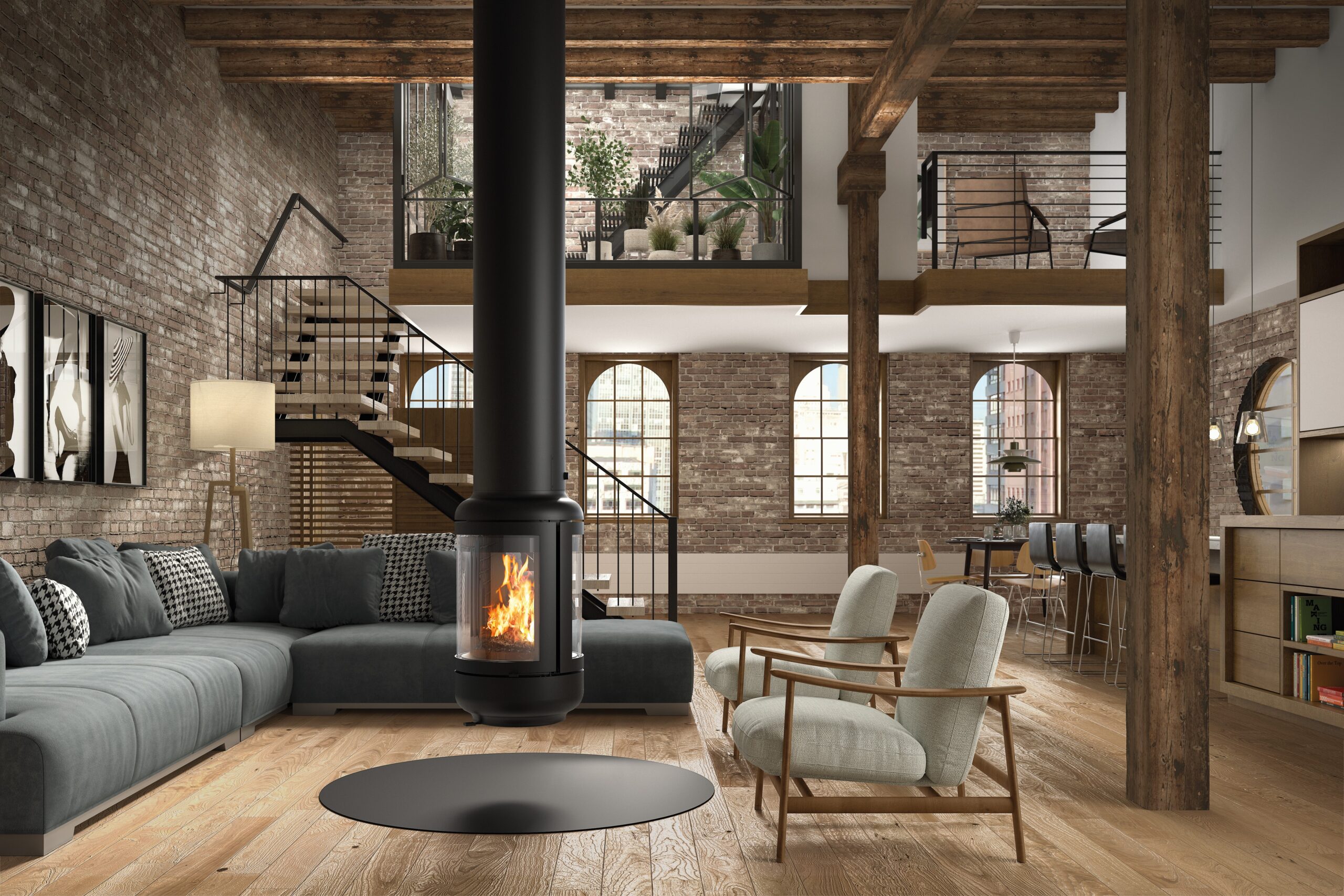 Designový závěsný krb Rocal Vesta Central zavěšený ze stropu v moderním dřevěném interiéru rodinného domu. V krbu hoří oheň.